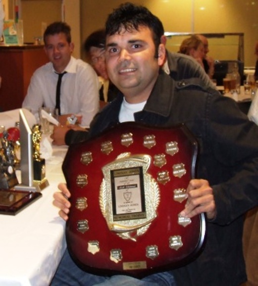 Club Champion Amit Chaudhary with his Lindsay Jones Best Clubman award and some of his other trophies.